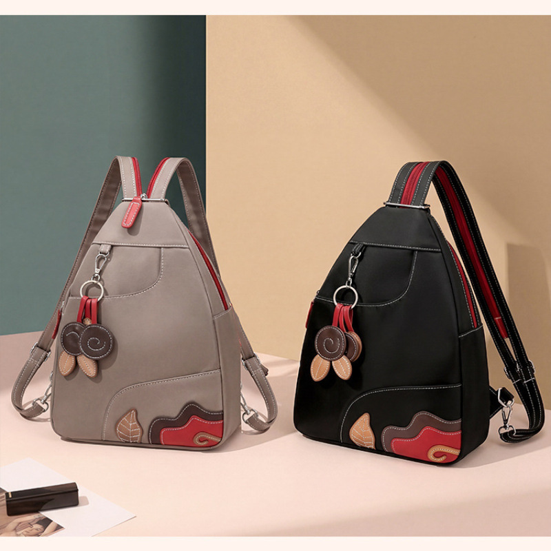 Fashion Backpack Women - กระเป๋าเป้สะพายหลังผู้หญิงสำหรับกิจกรรมกลางแจ้ง กันน้ำ ทำจากไนลอน ทนทาน ดีไซน์เรียบง่าย ใช้งานได้หลากหลาย